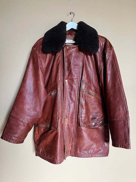 Brun skinnjacka med fårskinnskrage